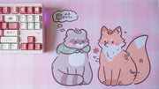 tanuki & kitsune pink plaid deskmat